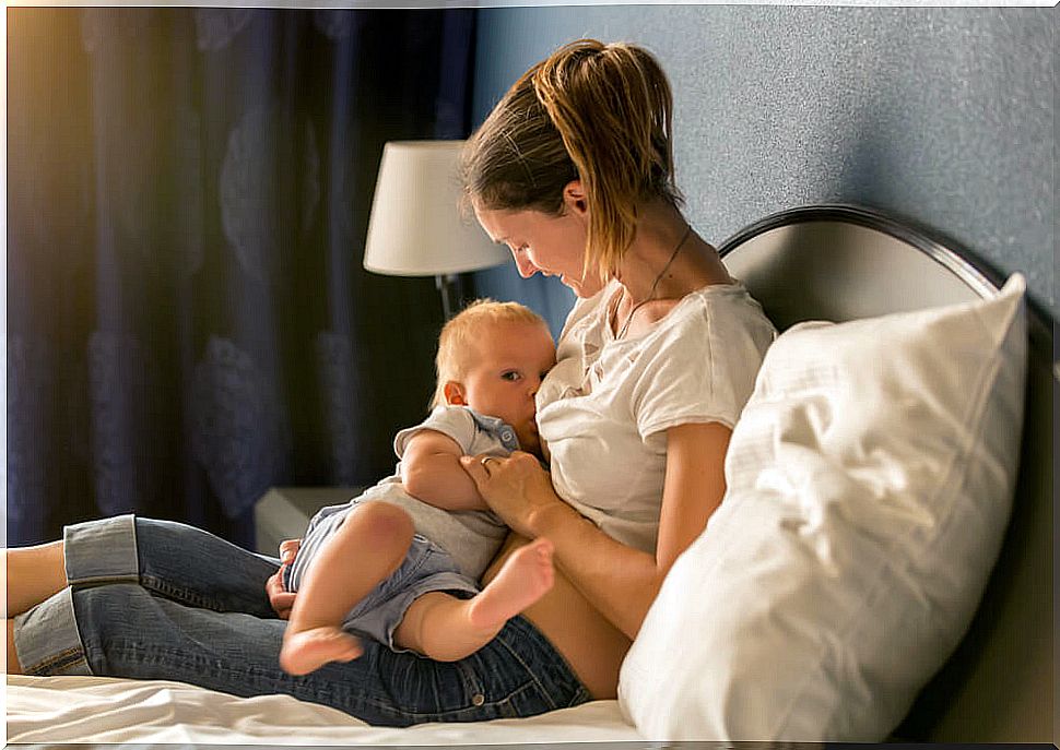 Mom breastfeeding her baby because breast milk is a functional food.