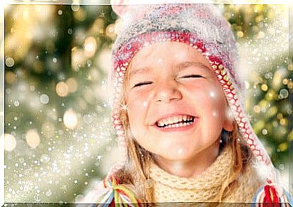 Little girl enjoying the magic of christmas