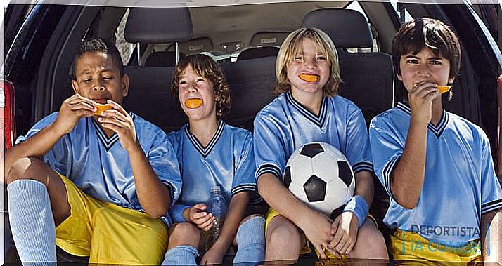 Boys' soccer team in car