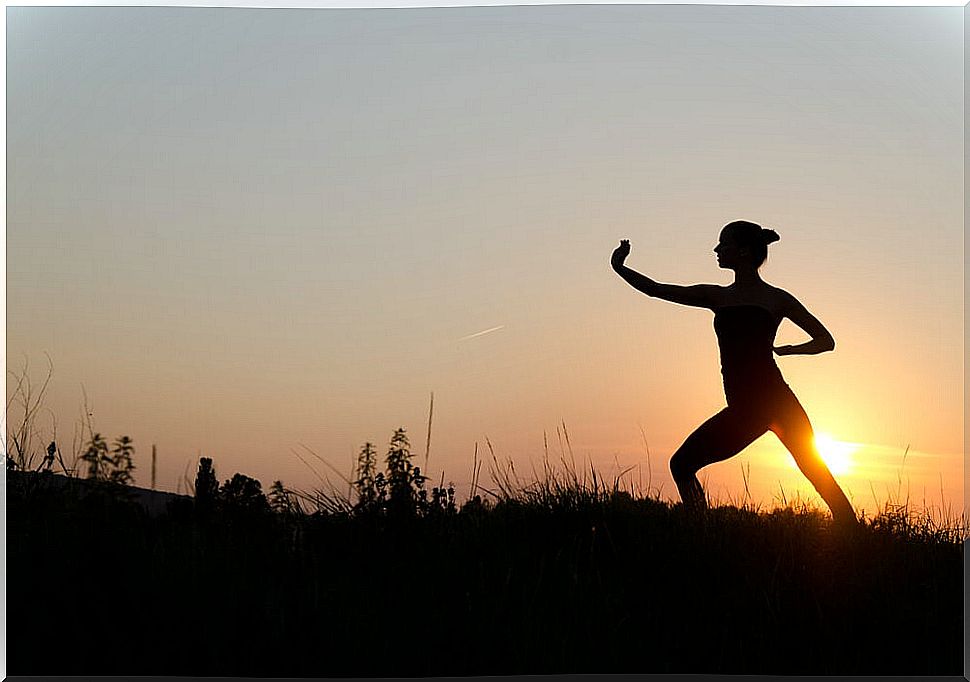 Woman doing tai chi in pregnancy.