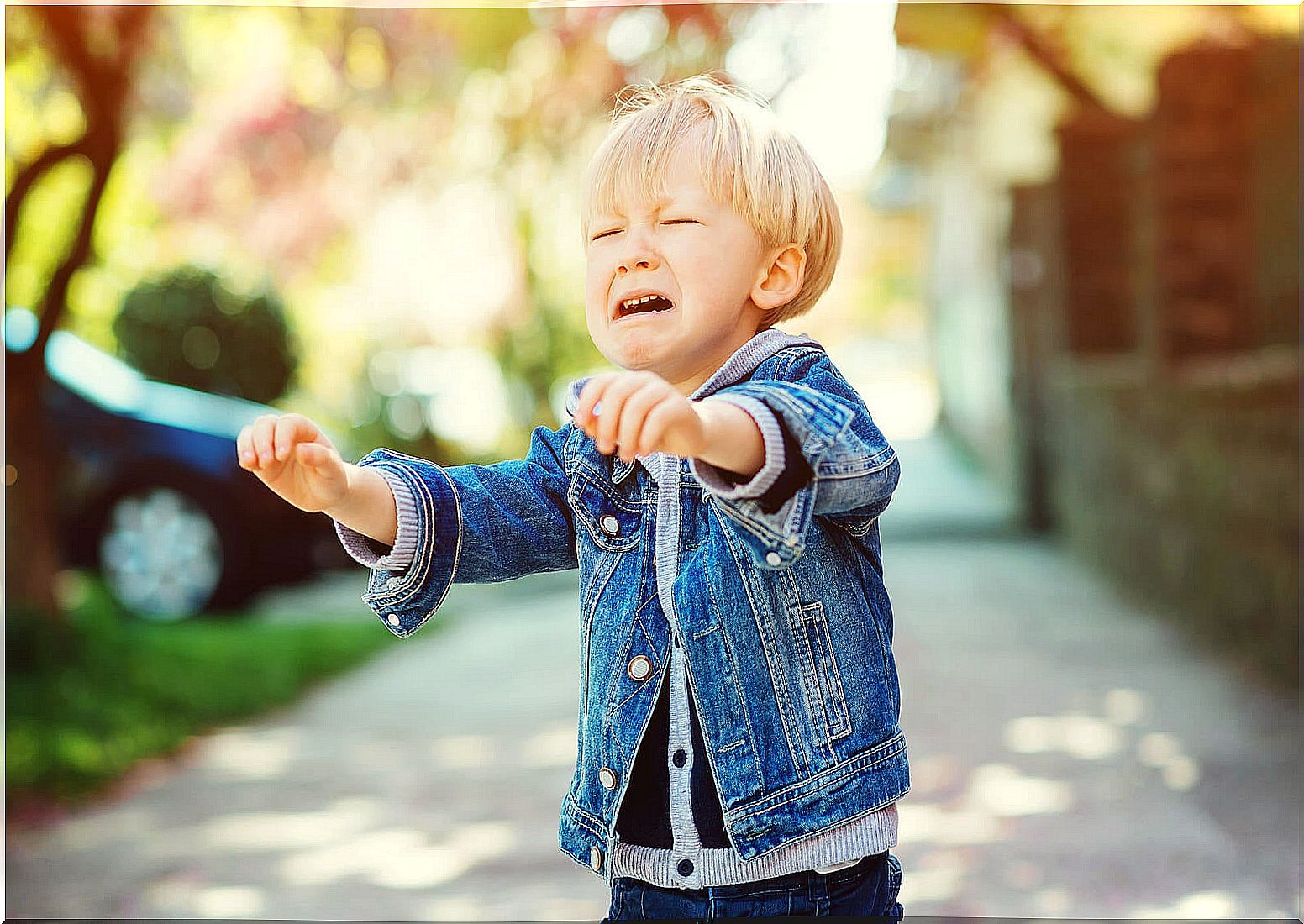 Boy crying because he has frequent tantrums in public.