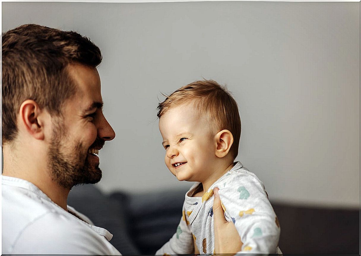 Father talking to his son making good use of language.