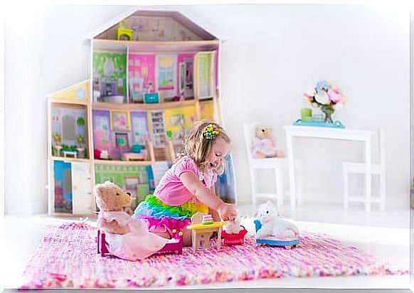 Little girl playing in her new bedroom