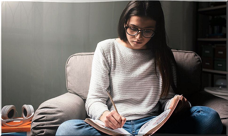 Girl studying to enter university.