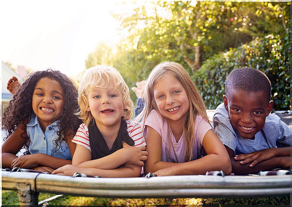 Children smiling and learning what soft skills are.