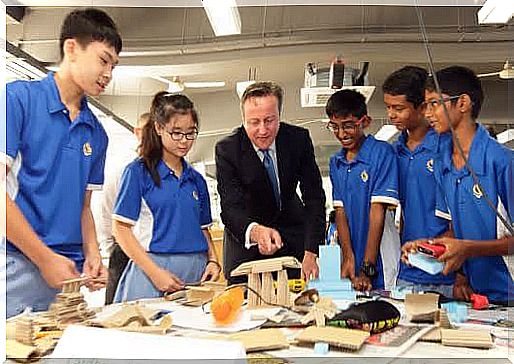 SINGAPORE - JULY 29: British Prime Minister, David Cameron (3rd L) engages with students during a Design & Technology lesson for a class of Lower Secondary School at the Commonwealth Secondary School on July 29, 2015 in Singapore.  Prime Minister, David Cameron is on a two day official visit to Singapore, the second of his four nation tour of South-East Asia, to secure trade deals and foster political alliance to counter the Islamic State group.  (Photo by Suhaimi Abdullah / Getty Images)